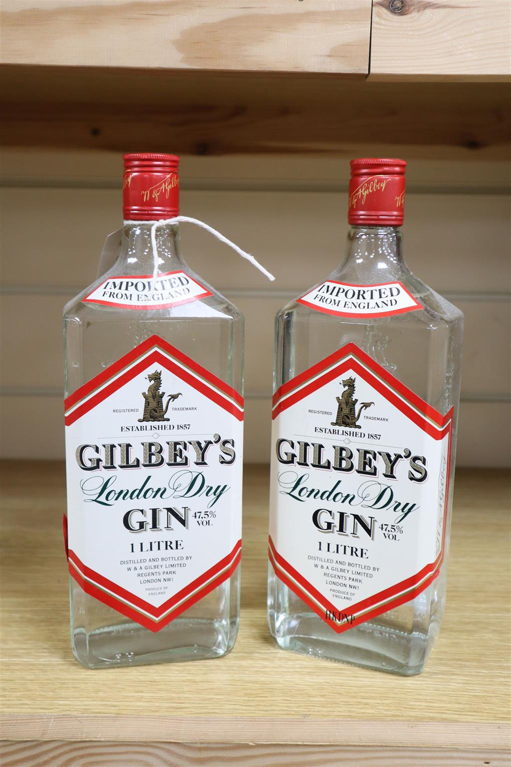 Two bottles of Gilbeys Gin